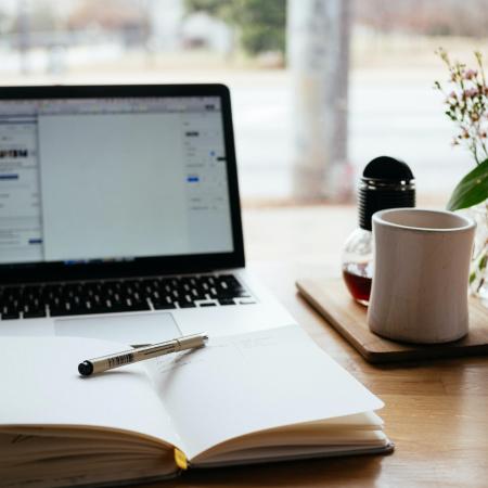 A laptop and a notebook